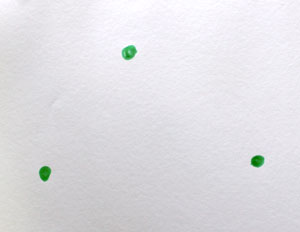 A Sprouts game board at the start: three green spots (nodes) drawn on paper with no connecting lines.