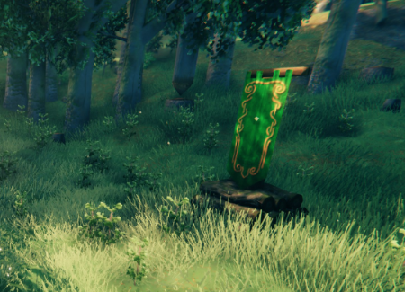 A Forester's Post, a woodpile under a green banner, standing in a birch wood