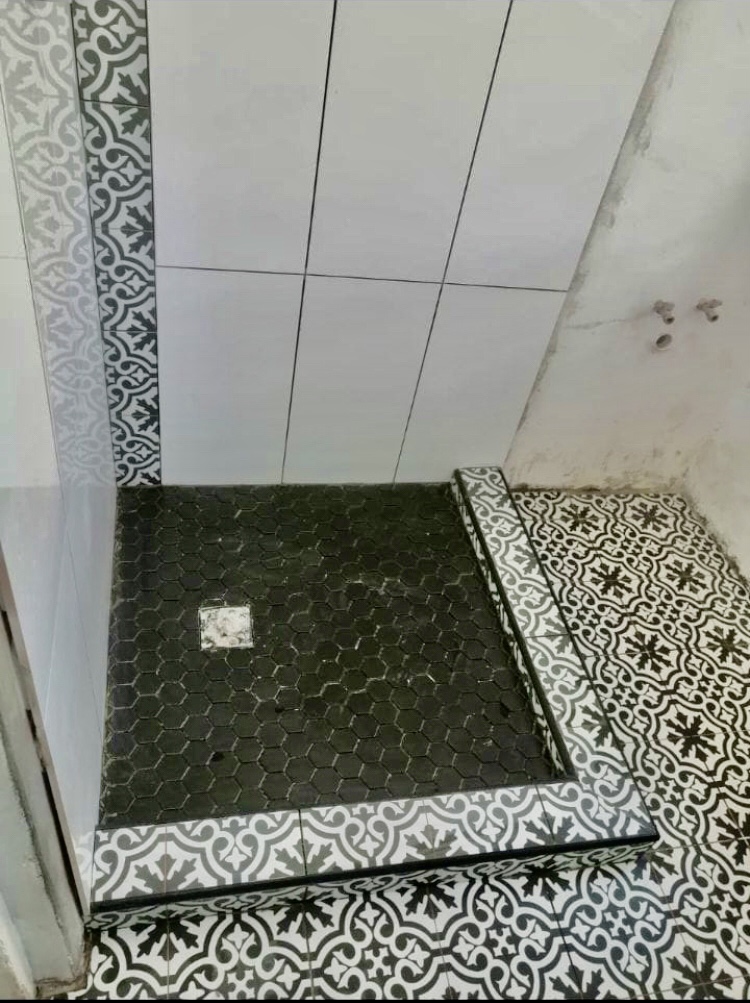 black bathroom tiling