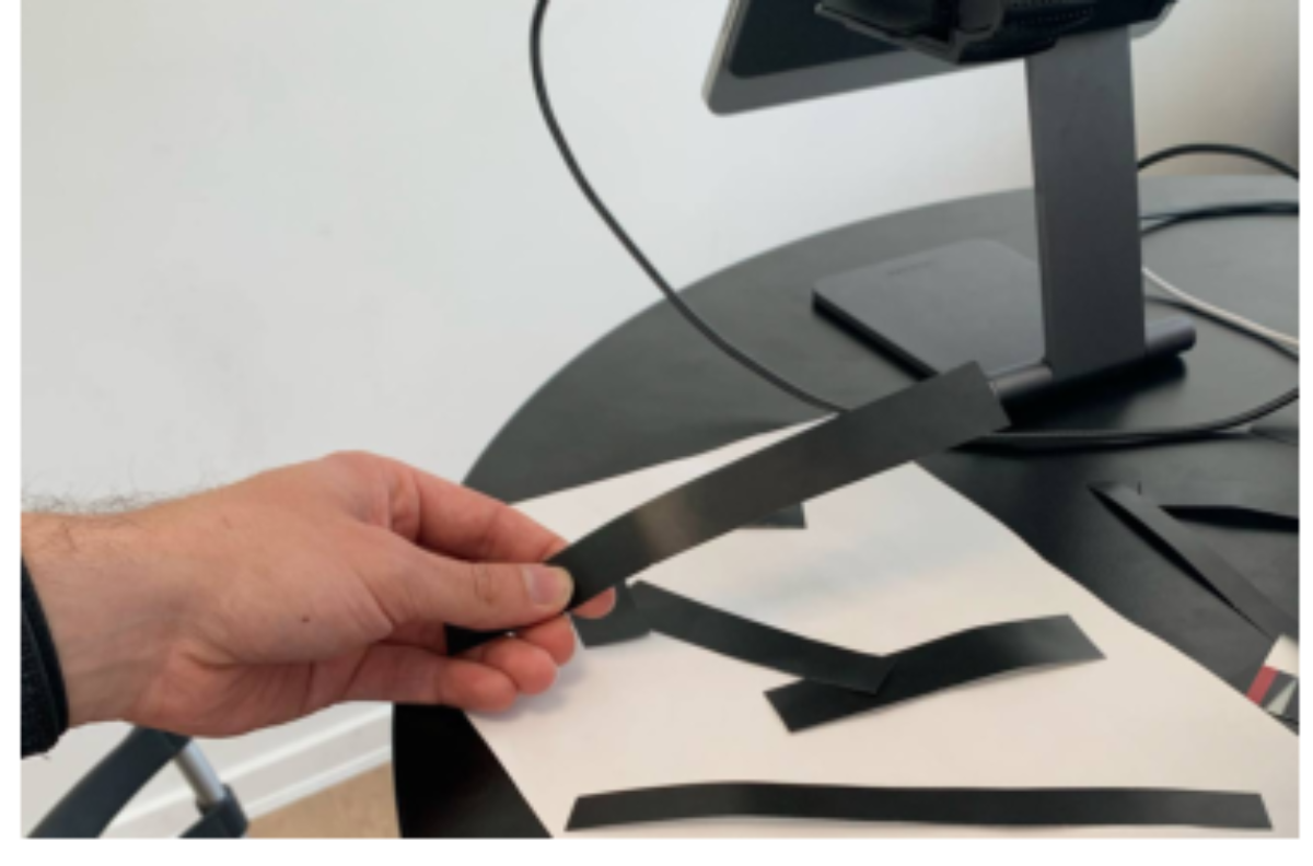 原论文 Figure 3:Contrast-based synthesizer: dark paper shapes placed on white background modulate oscillator…