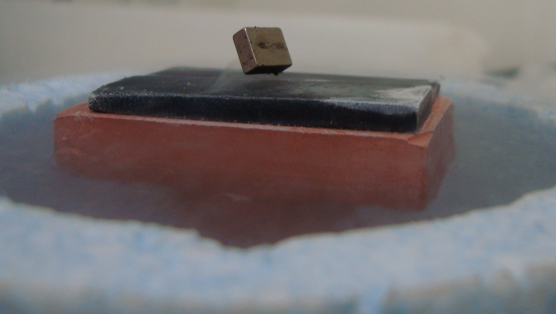 Magnetic levitation with superconductor pellets