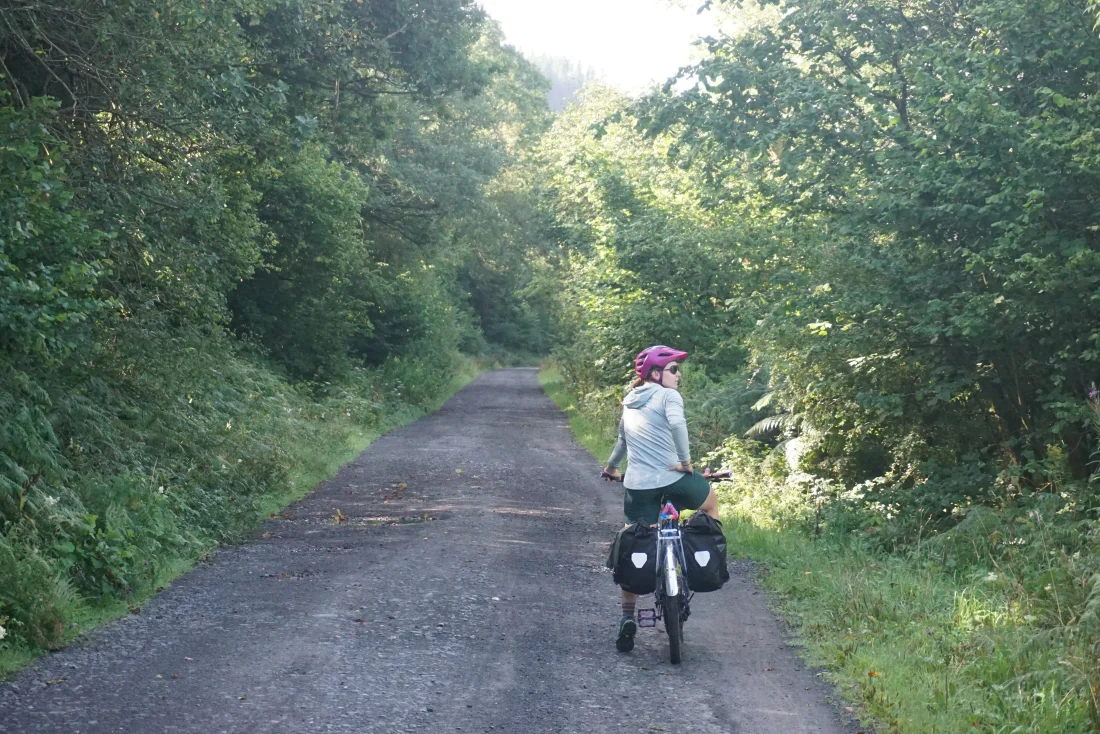 meg contemplating just how fortuitous this rail trail grade is