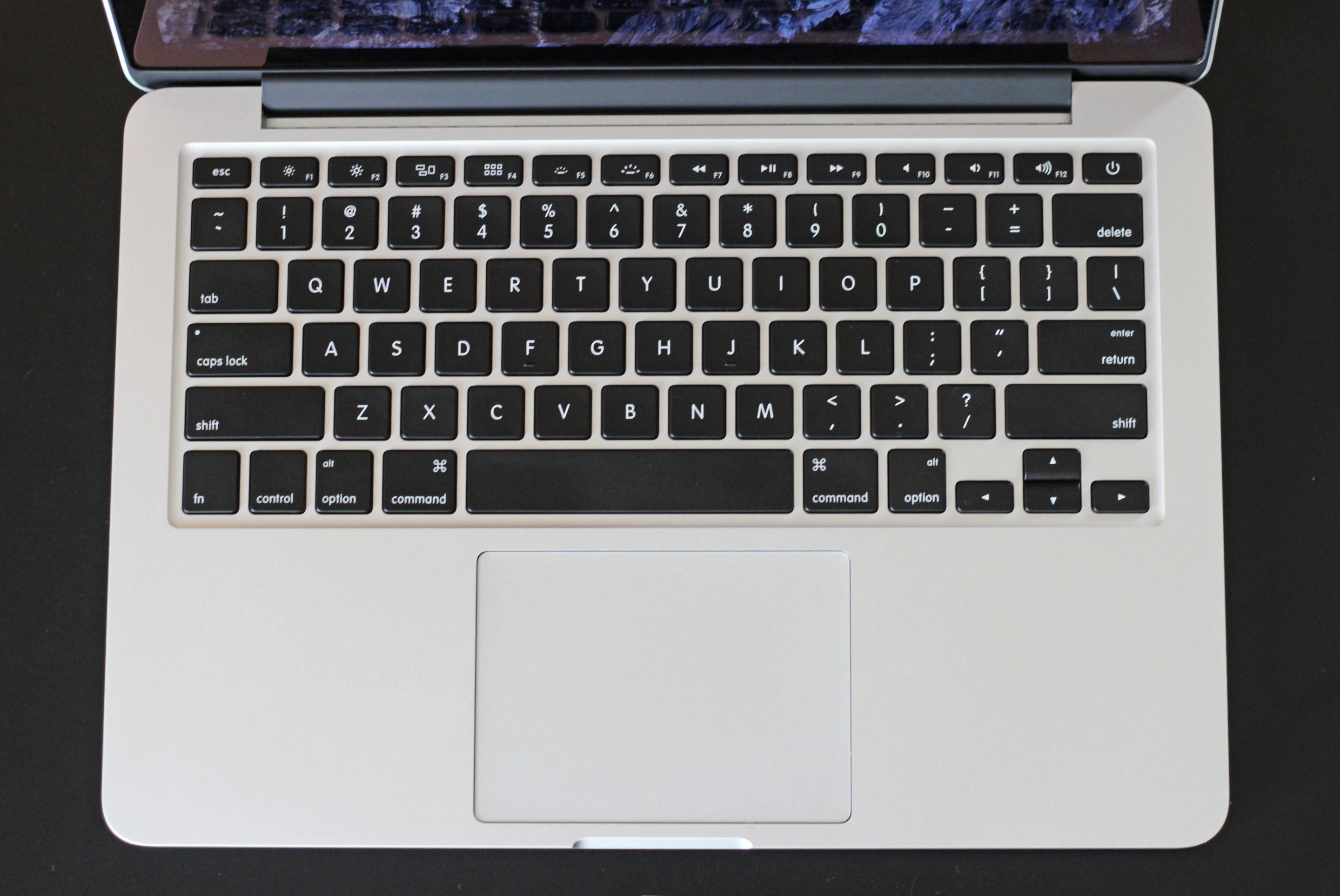 the 2015 macbook pro: note the dedicated keyboard brightness keys