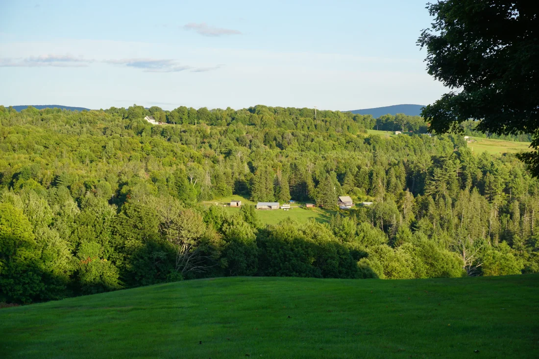 first glimpse of our five-years-running farm campsite from the ridge