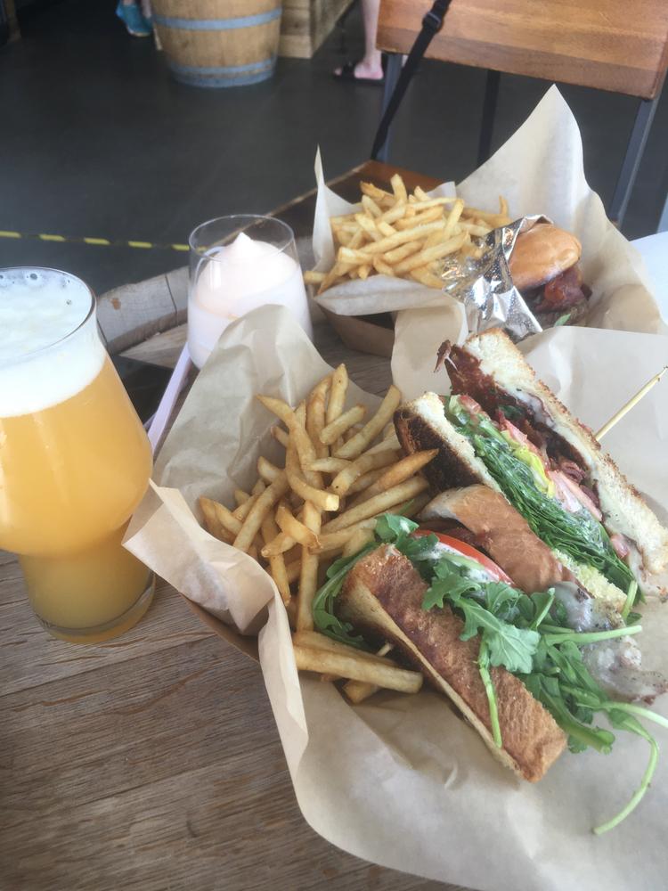 a well earned sandwich, burger, and brews