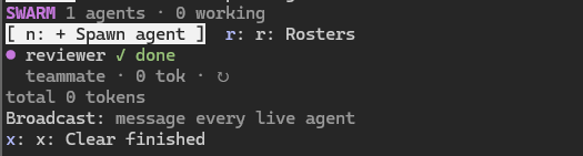 The swarm pane: a Spawn agent button, Rosters, one finished reviewer agent with its token count, Broadcast and Clear finished