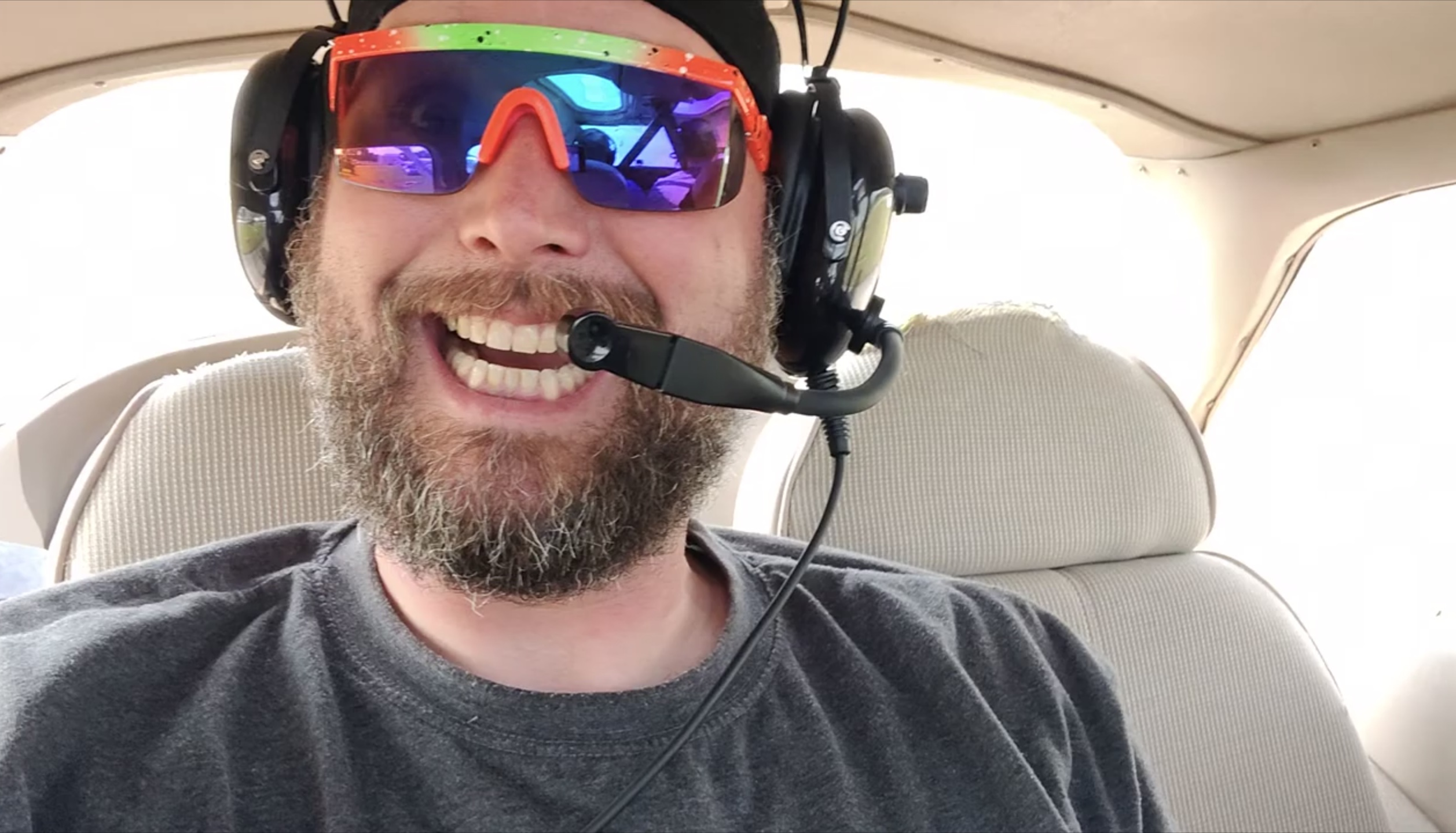 Jake smiling as he shares a unique flying experience with his family.