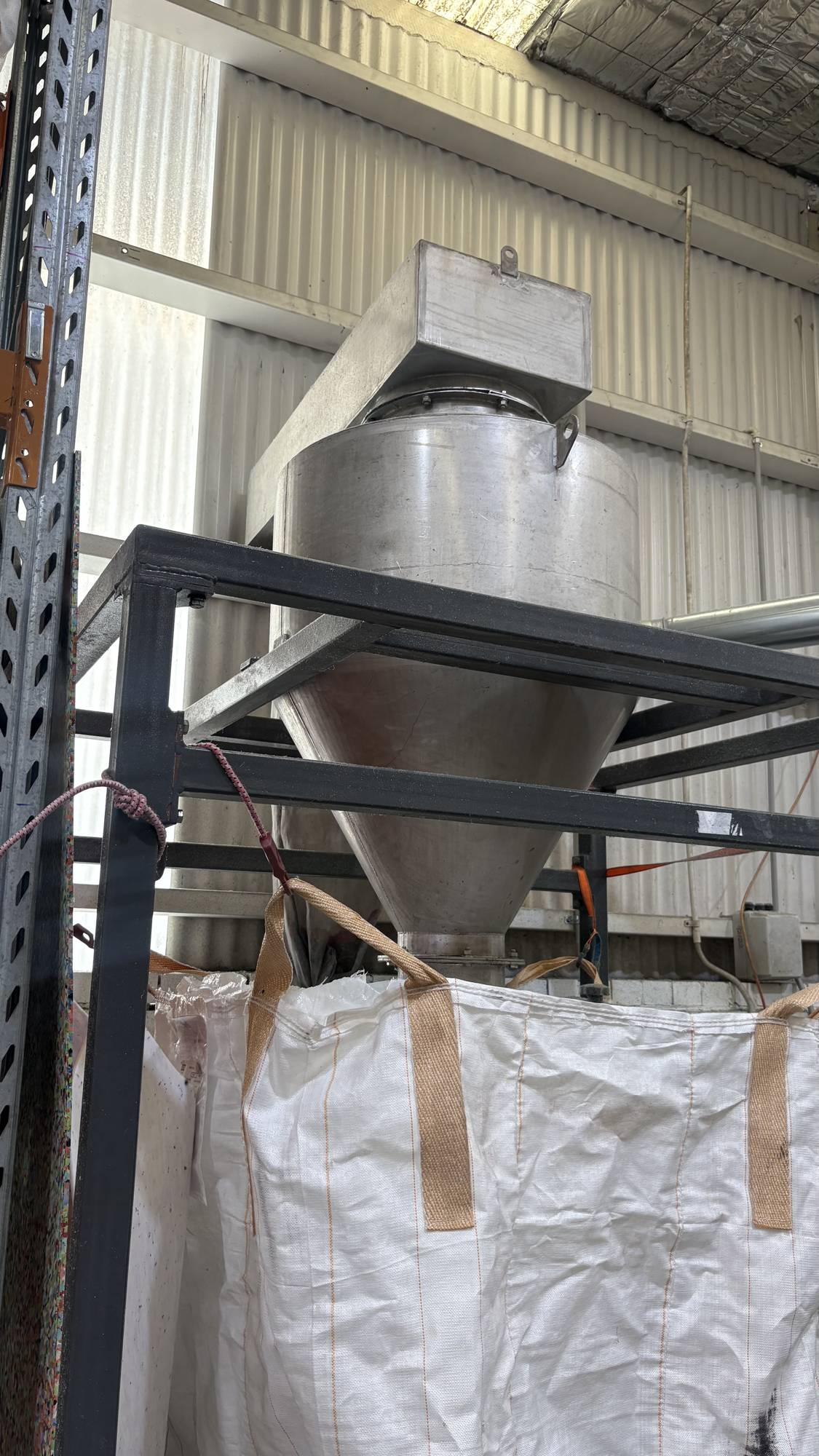 The main feed hopper the lift needed to support.