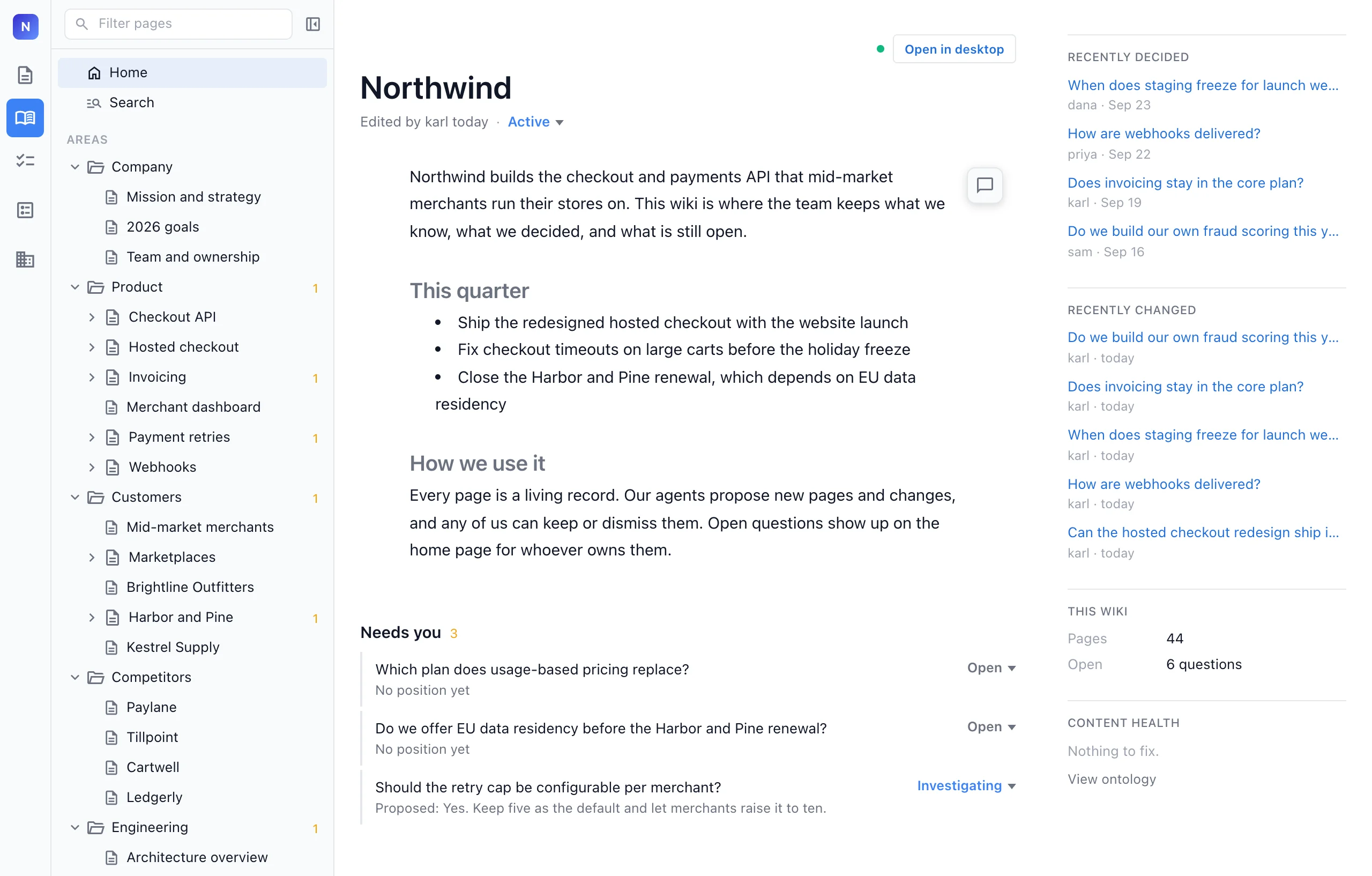 The team wiki home page in the Nimbalyst web console, with the page tree, the open questions that need the team and recently decided items
