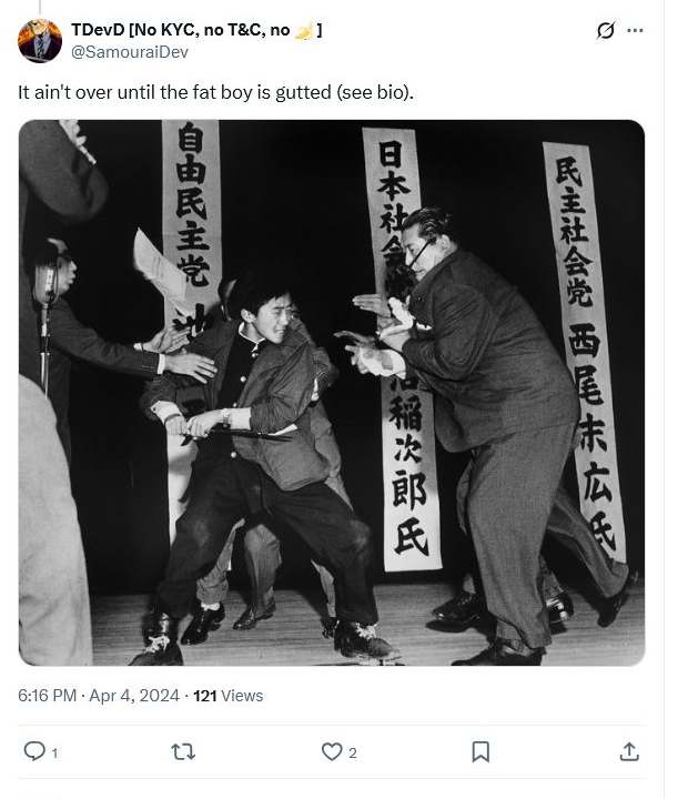 TDevD writing that it was not over until nopara73 was gutted above the photograph of Inejirō Asanuma's assassination