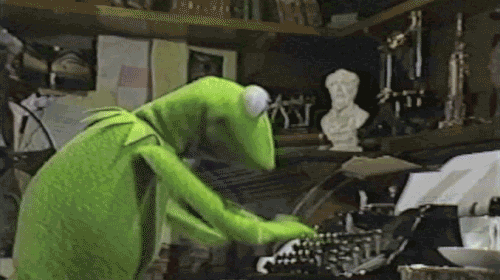 Gif of kermit the frog typing quickly on a typewriter