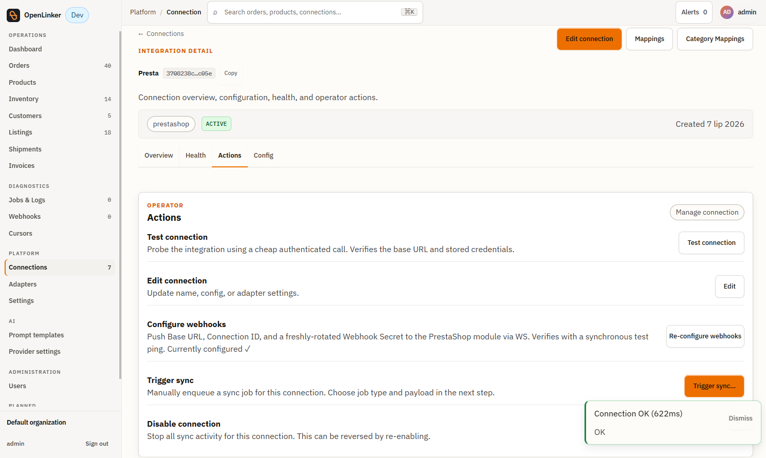 Connection detail page — Actions tab with "Re-configure webhooks" (currently configured) and a successful test connection