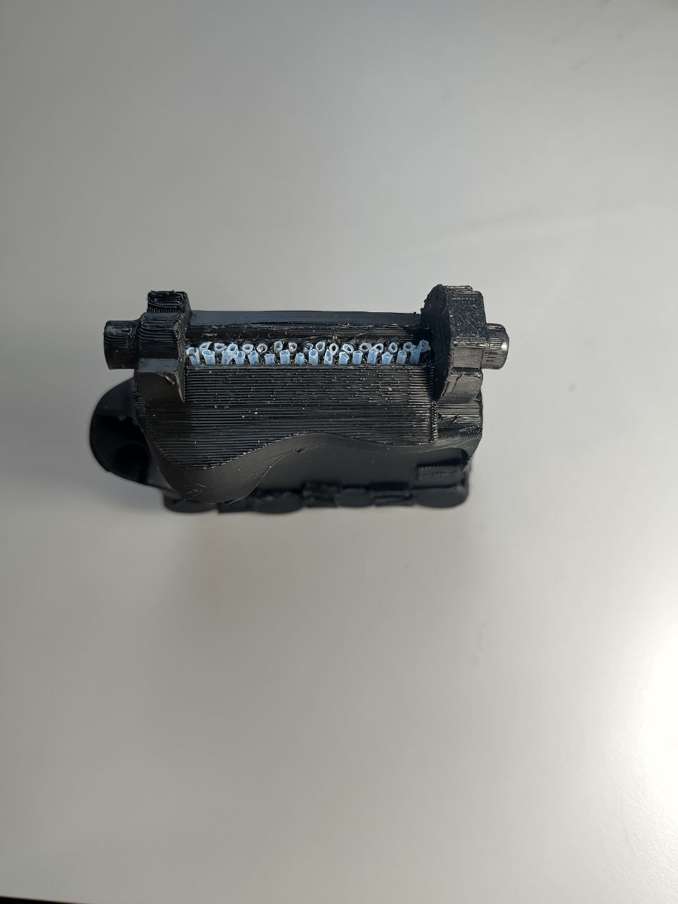 Carpals with all 32 PTFE tubes fitted and trimmed