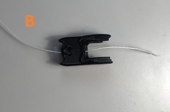 Step A: knotted tendon threaded through the PTFE tube