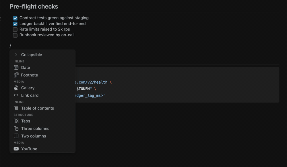 Typing slash opens the block menu, filtering to Three columns as you type, which inserts a live three-column block