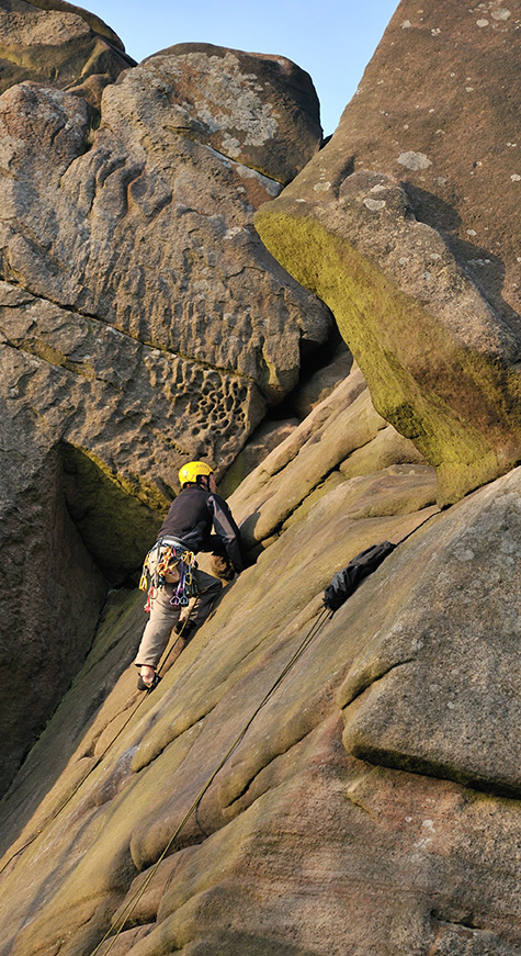 A young climber facing up to the challenge