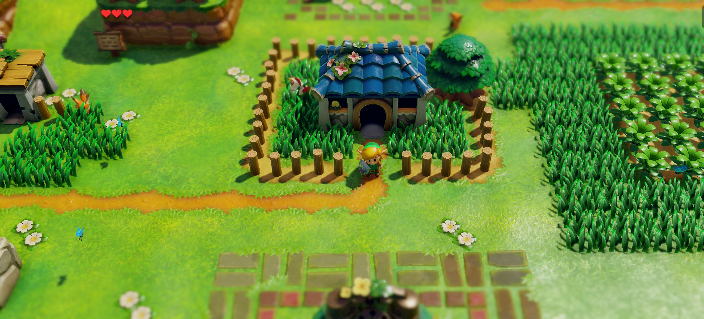 Mabe Village in a 21:9 window: the unlocked aspect ratio shows more of the island