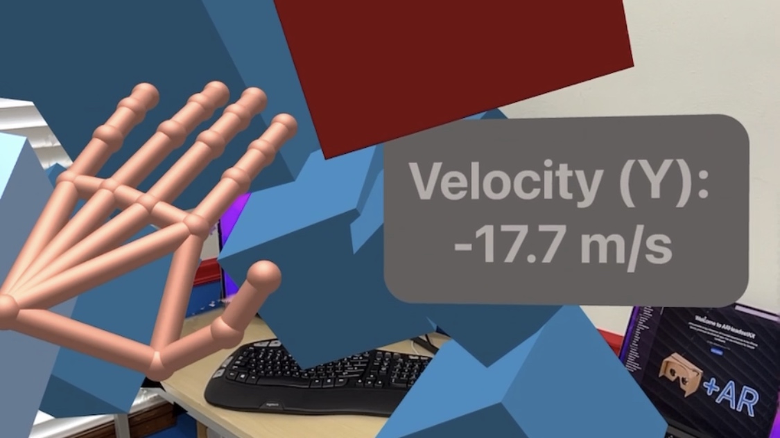 Text in augmented reality showing that Y velocity is -17.7 meters per second