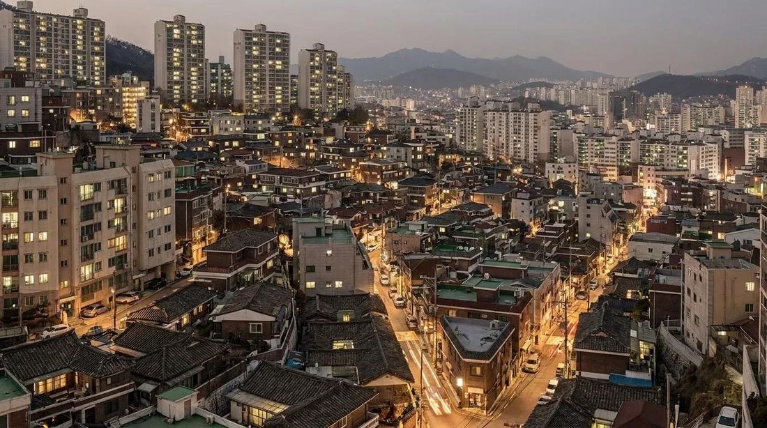A hillside neighborhood at night seen from above