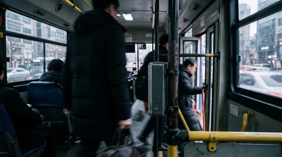 A card reader by the door inside a city bus
