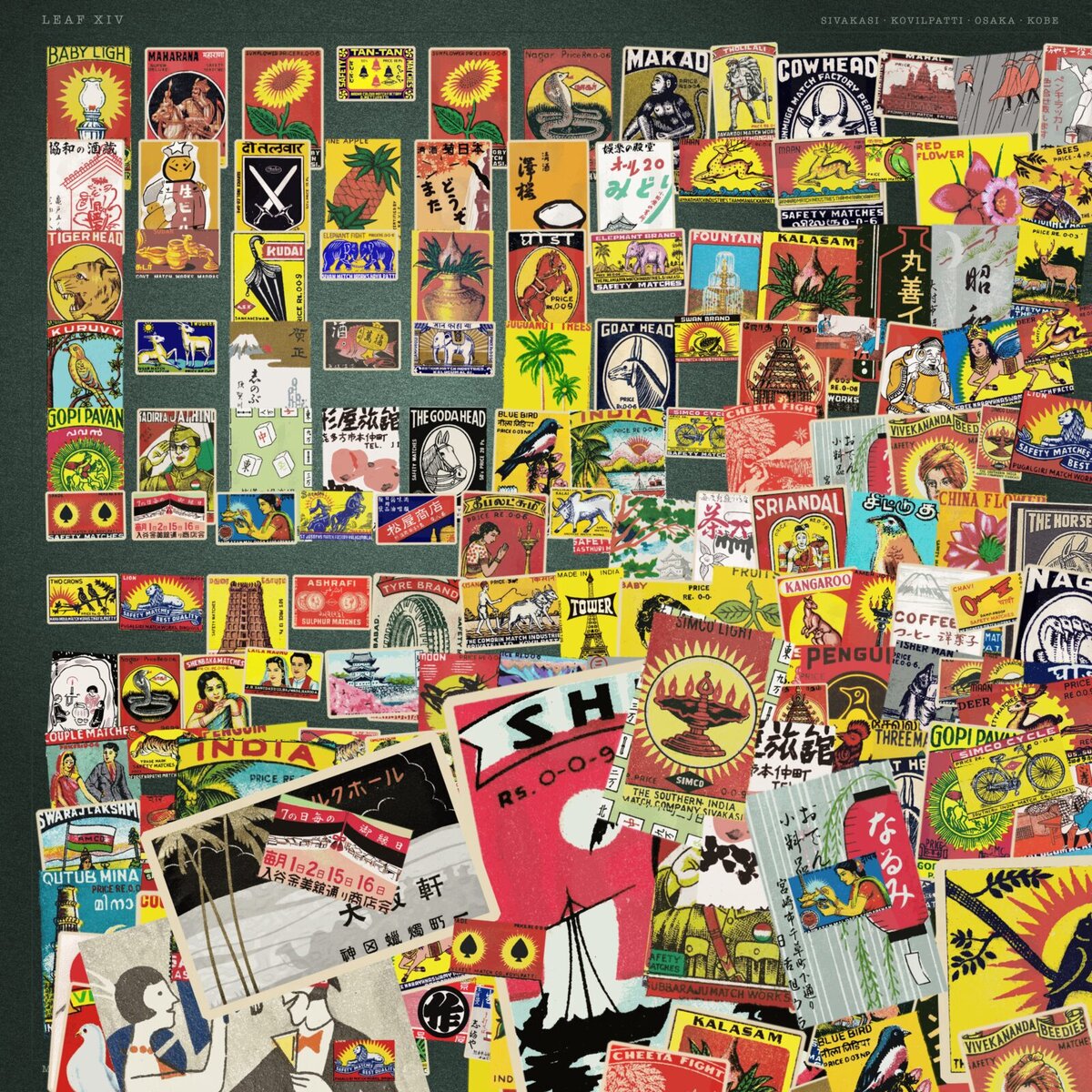 Strike Anywhere — a square sheet packed with hundreds of vintage Indian and Japanese matchbox labels, tidy rows in one corner decaying into an overlapping pile