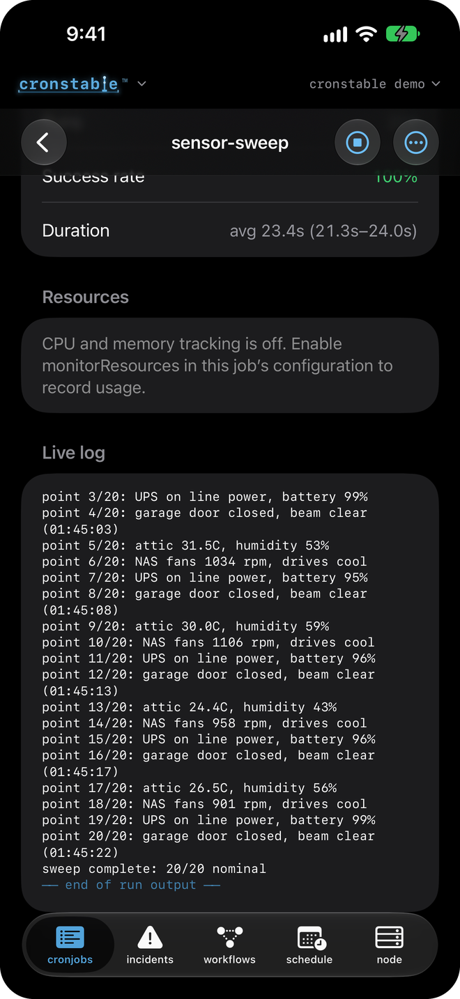 A job's live log tail in dark mode, below its run stats and resource panel