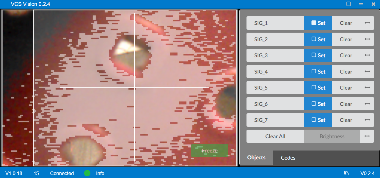 The Vision Utility recognizing a red gear's color signature, creating a white rectangular overlay to show object recognition.