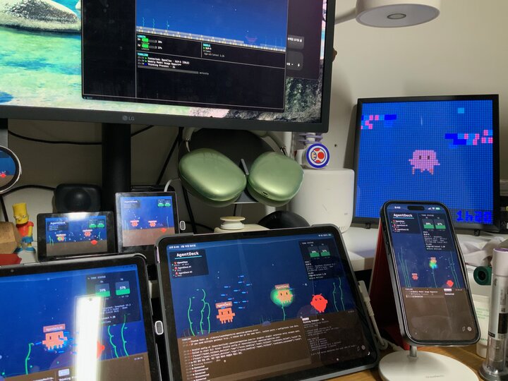 iPad and iPhone showing terrarium with pixel art creatures