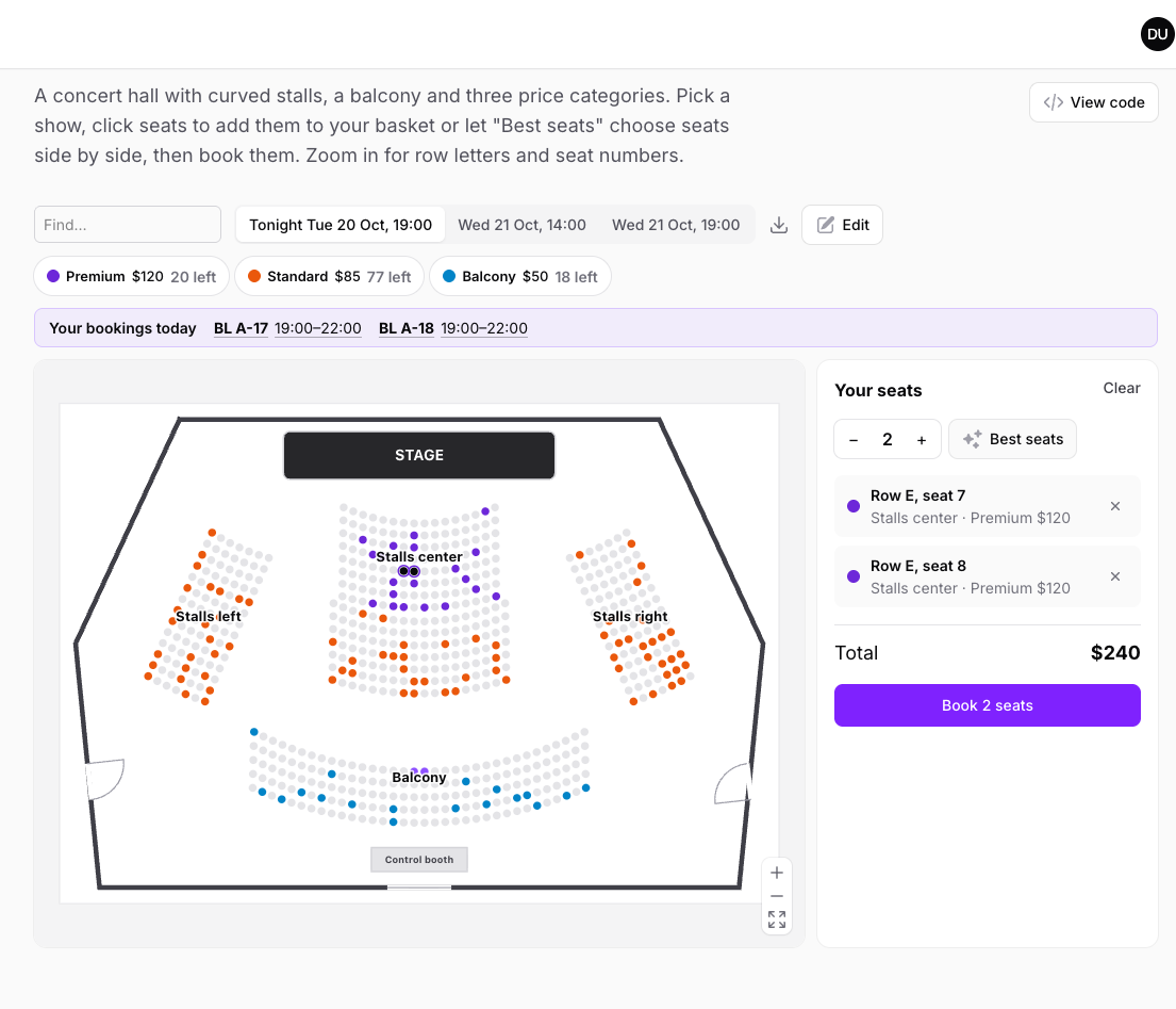 A theater seat map with curved sections in three price categories and two seats in the basket