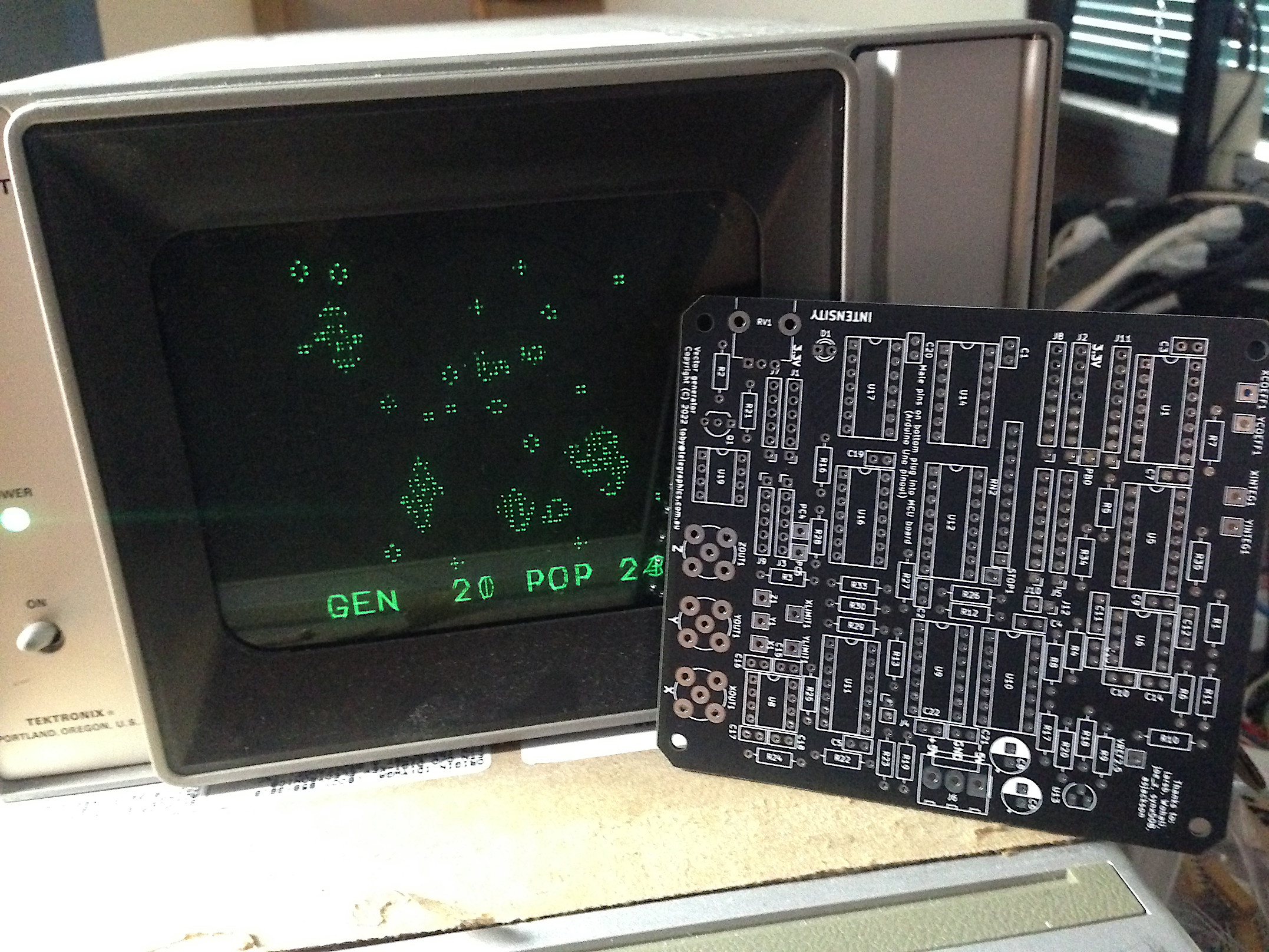 Game of Life displayed on Tektronix 602, along with blank pcb
