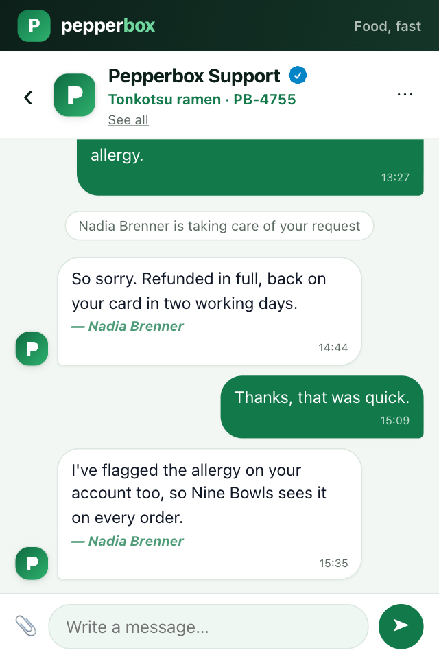 The conversation, with the desk's verified badge and an answer signed by the agent who wrote it