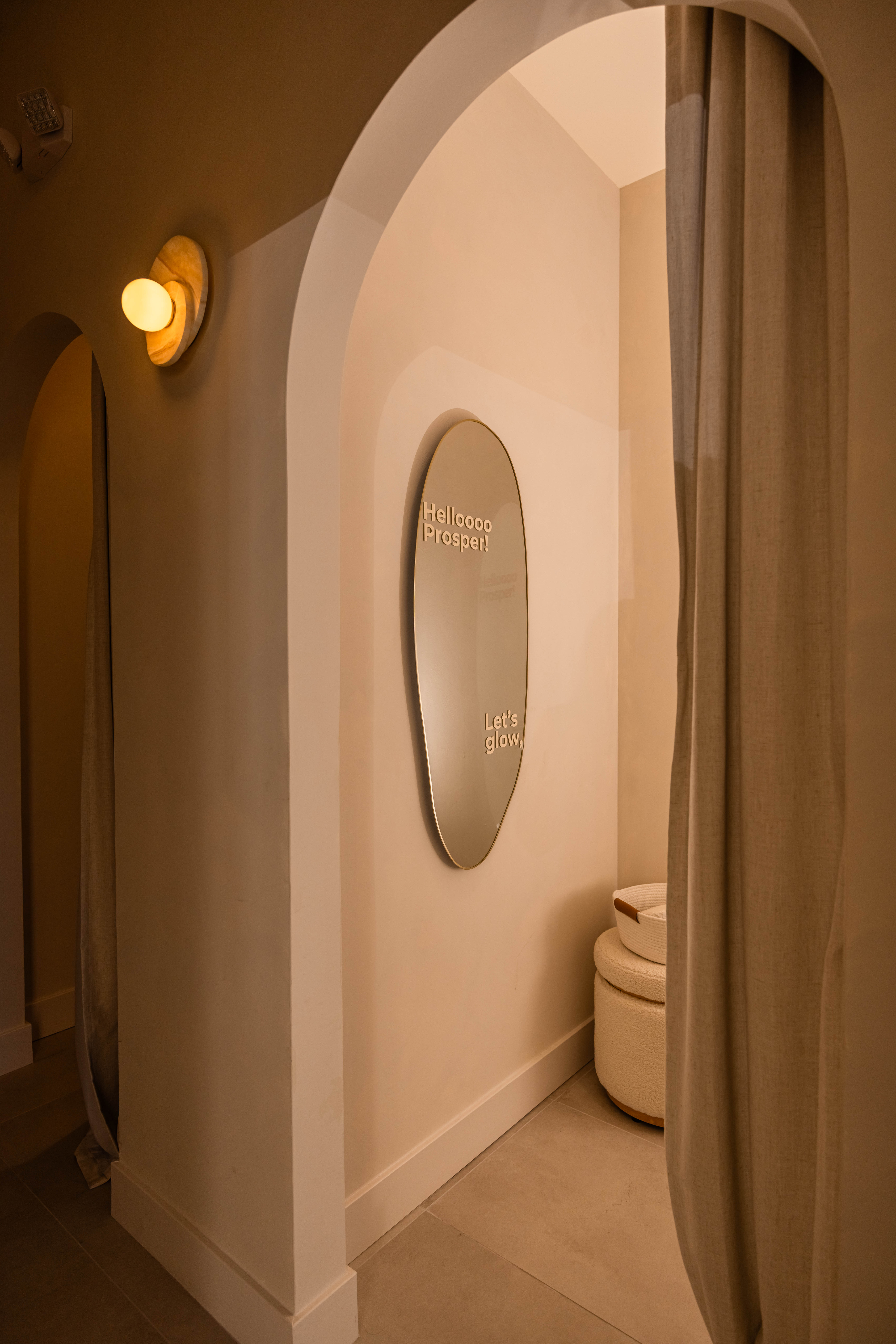 Lois Head Spa arched entryway and signage in Prosper, Texas — welcome and consultation area