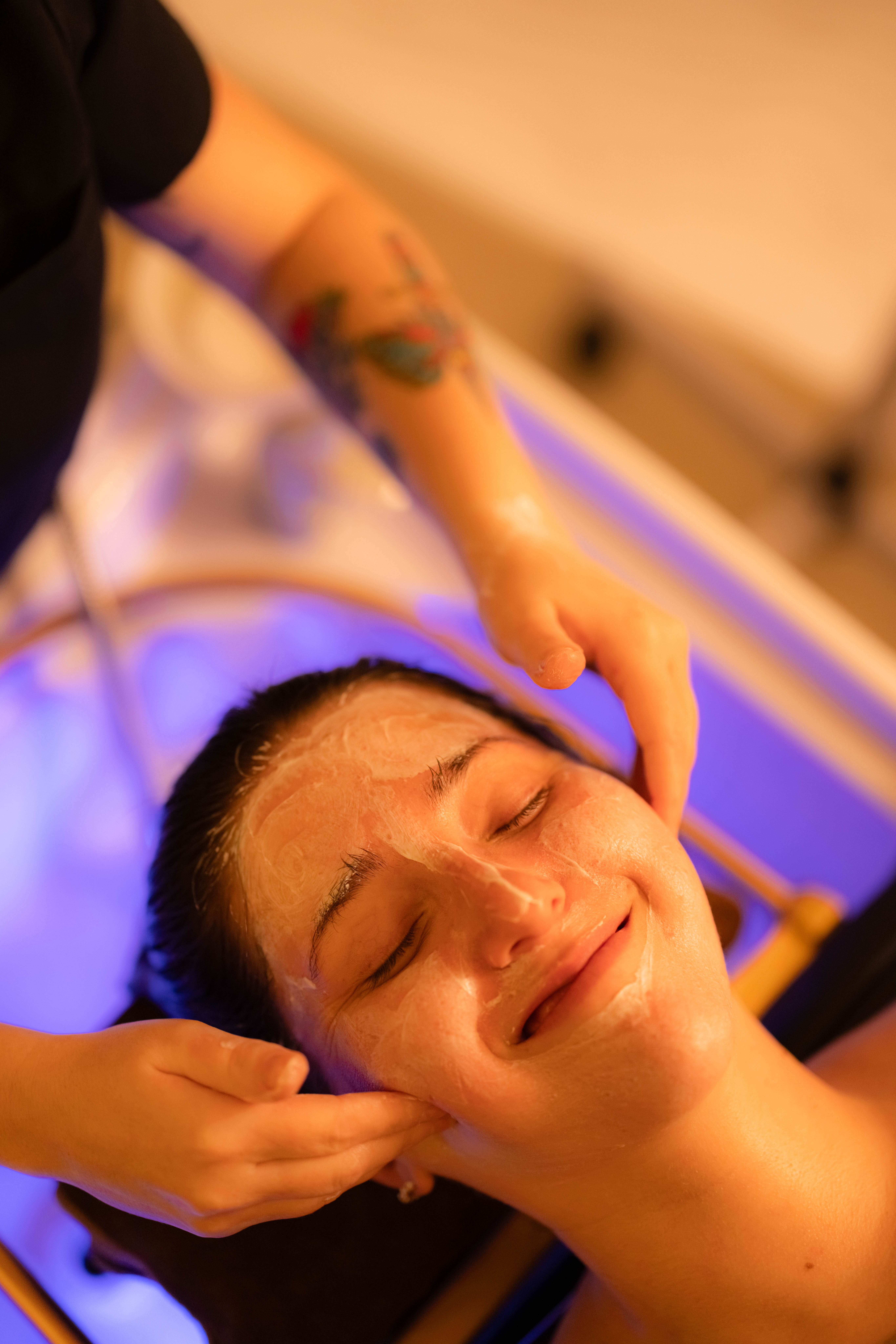 Warm, close-cropped moment from a scalp ritual at Lois Head Spa