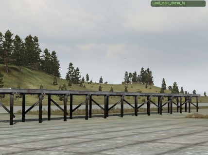 Land_molo_drevo_bs