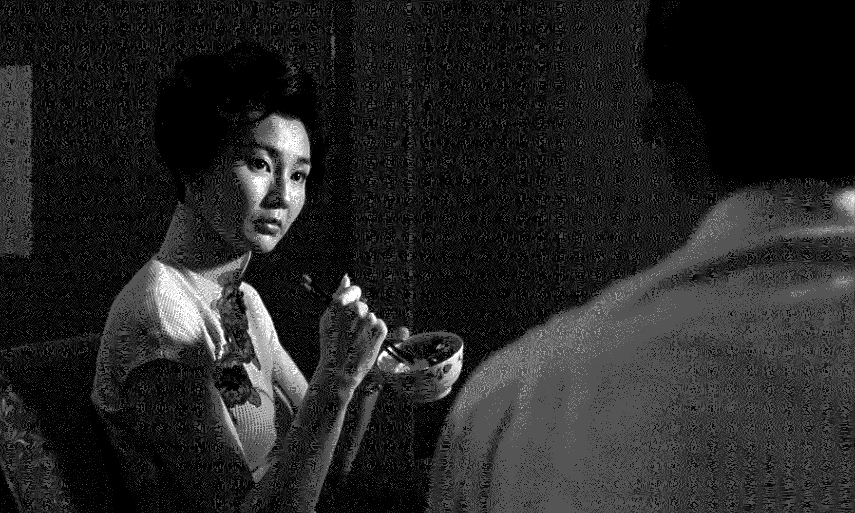 A black and white dithered still image from the movie 'In the Mood for Love'