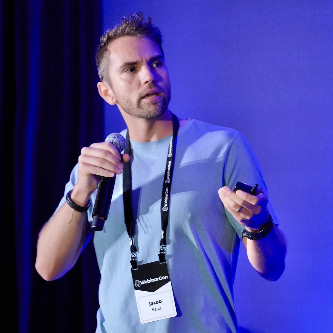 Jacob Beau, founder of Concept, speaking on stage at WebinarCon