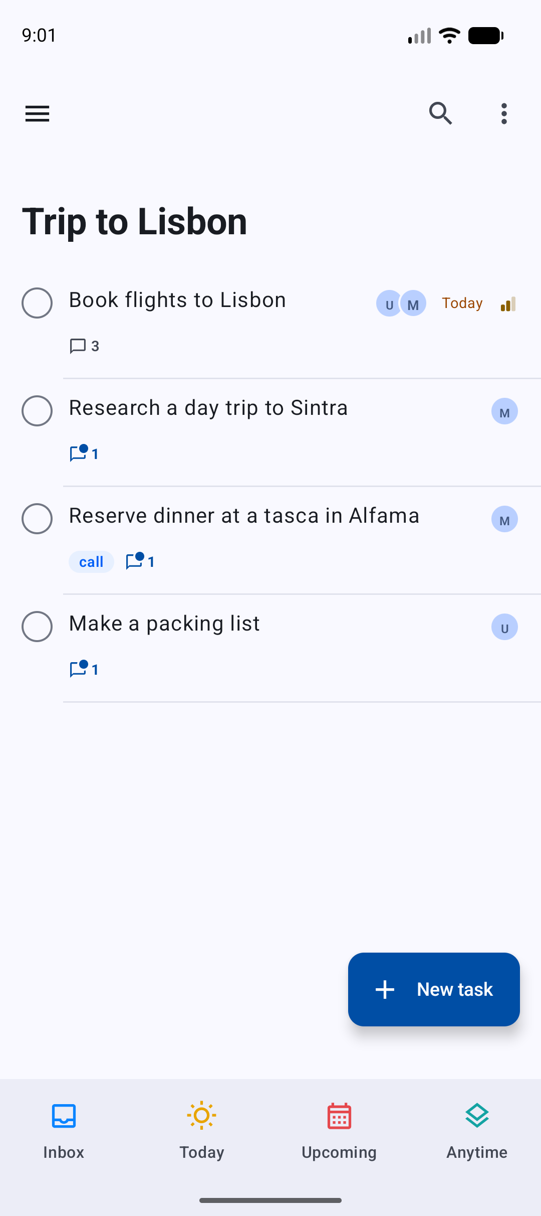 A shared project: rows show who is assigned and how many comments each task has