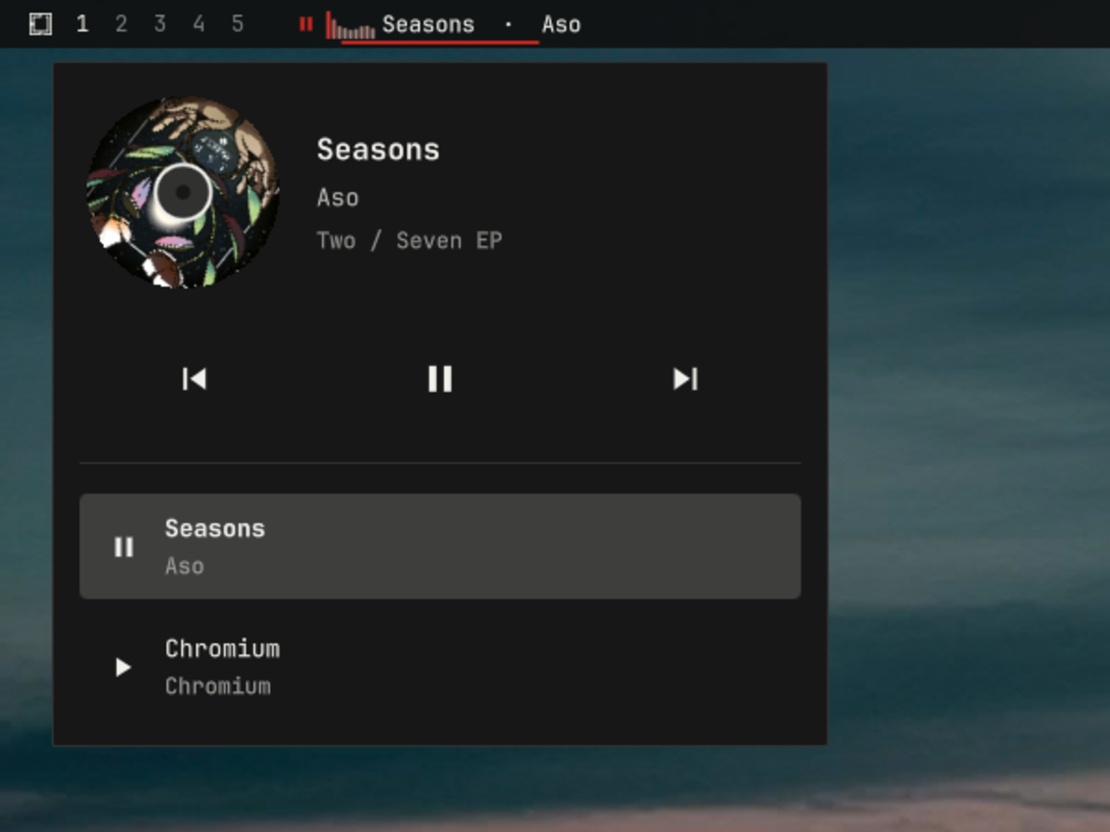 Media popup with circular album art, transport controls, and source switching