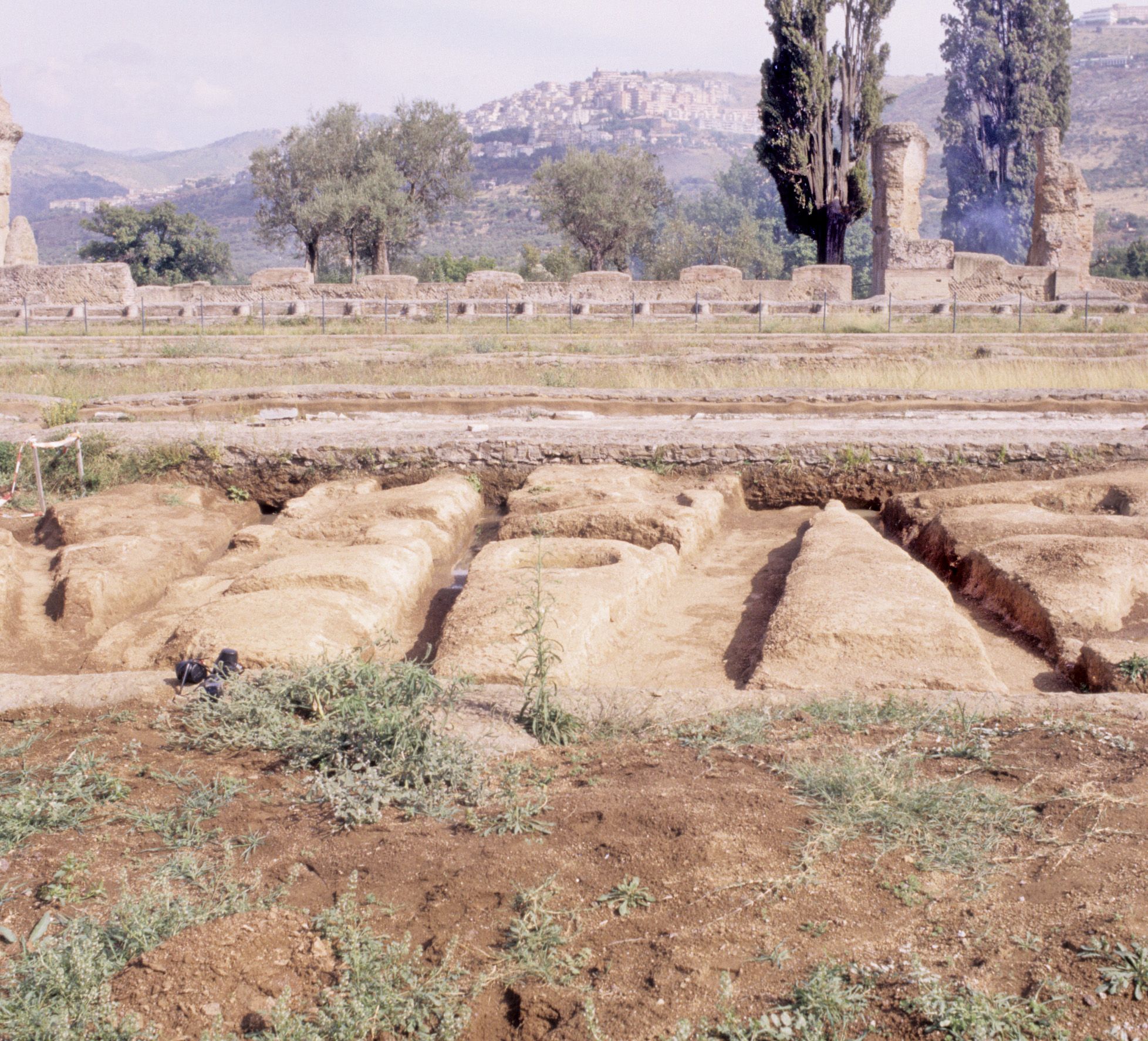 Eastern view of the excavations of the Piazza d'Oro garden at Hadrian's Villa, showing the low rectangular cuts in the tufa through which irrigation seeped into the garden canals