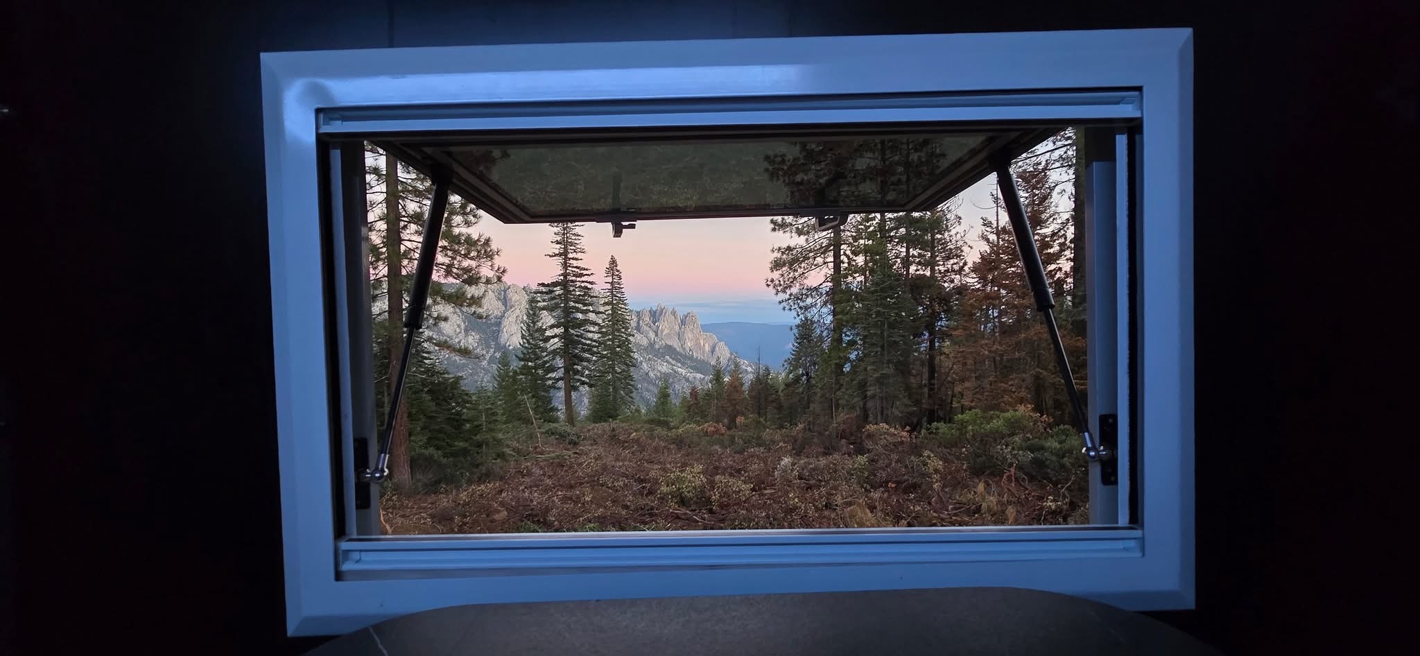 Castle Crags sunset viewed through the dinette safari hatch.