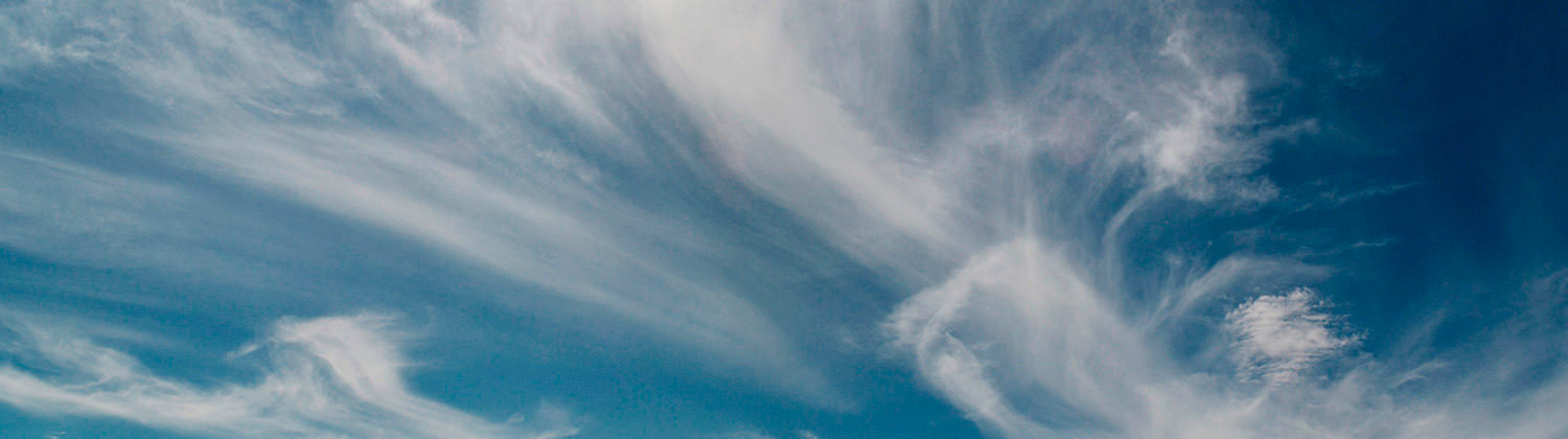 Blue sky with whispy clouds