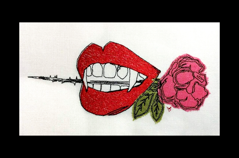 Vampire Teeth with Rose free embroidery design