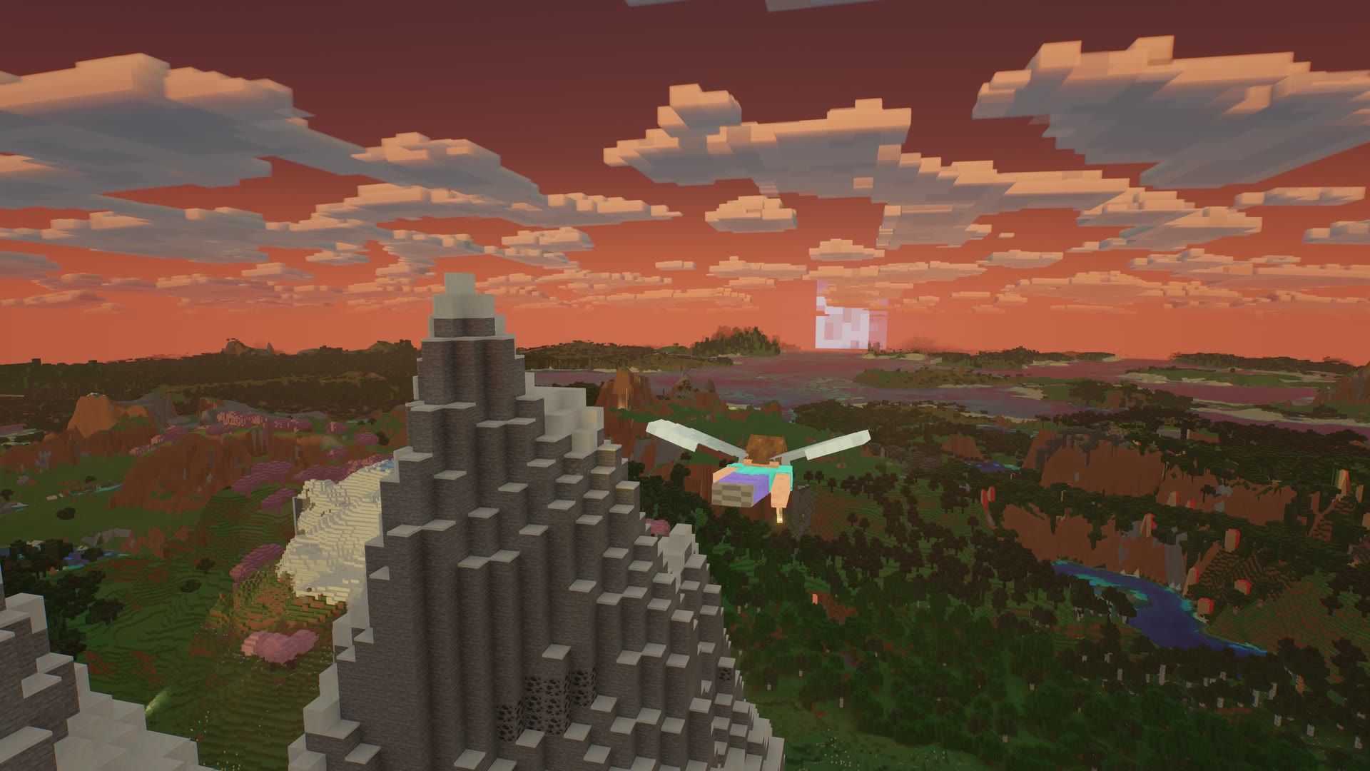 Minecraft shaders on Mac: flying with an elytra over the mountains at sunset