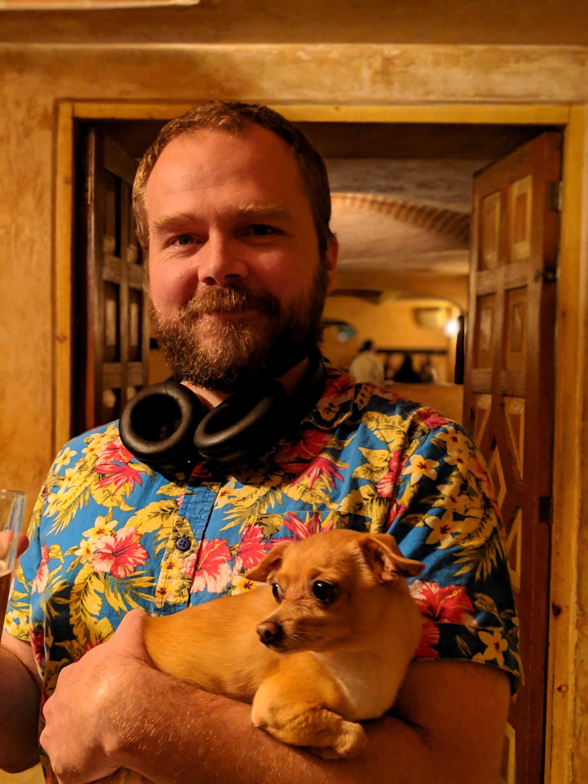 Man (Stephen Cagle) holding beer & small dog (Chihuahua)