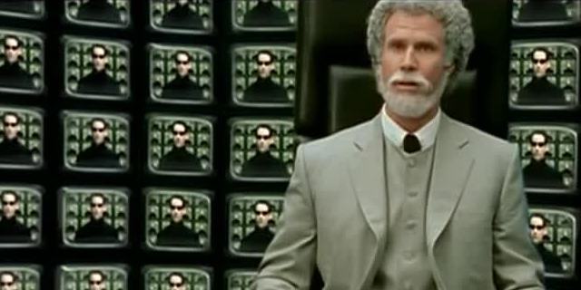 Will Ferrell, wearing a 3-piece suit, sits in front of a wall of computer monitors, each of which shows Neo from the film THE MATRIX.