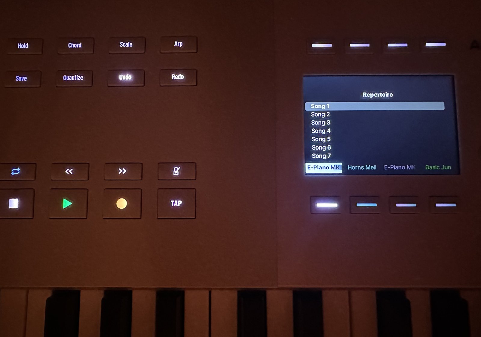 KeyLab 88 mk3 with KeyLabLive: the song list on screen, track names on the screen buttons, transport buttons lit