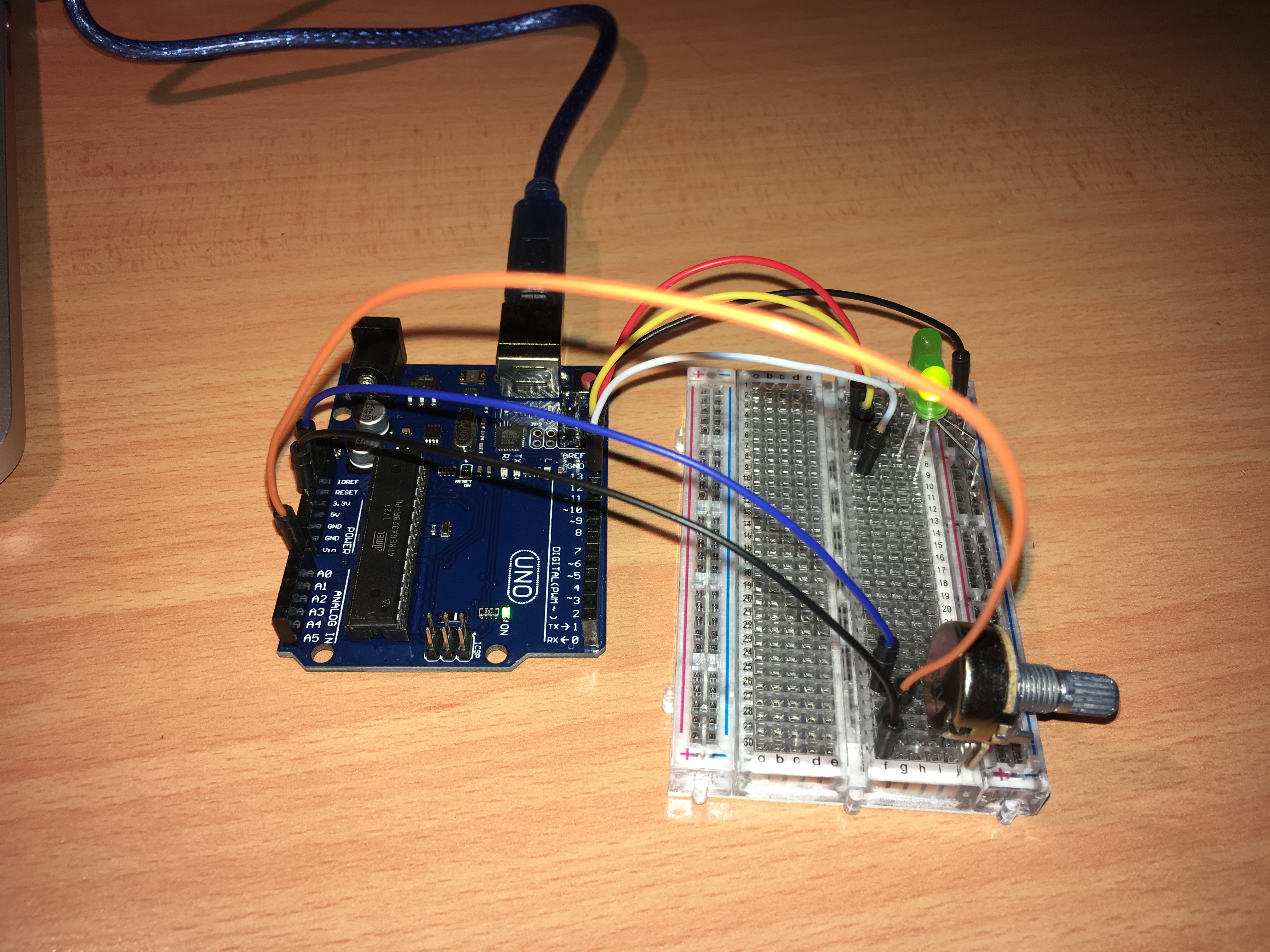 Breadboard with Arduino Uno showing wiring