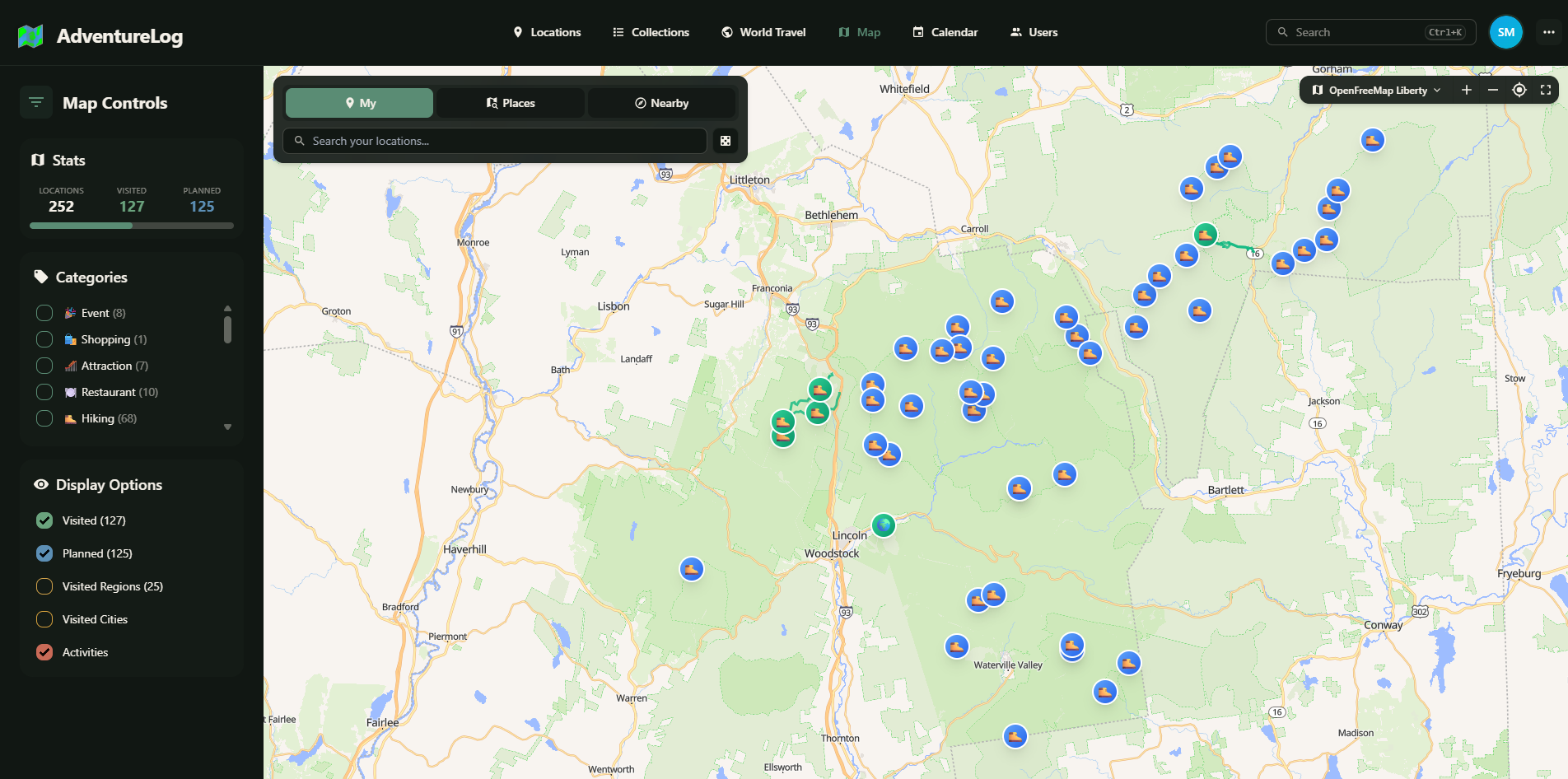 Interactive world map with location pins and visit filters