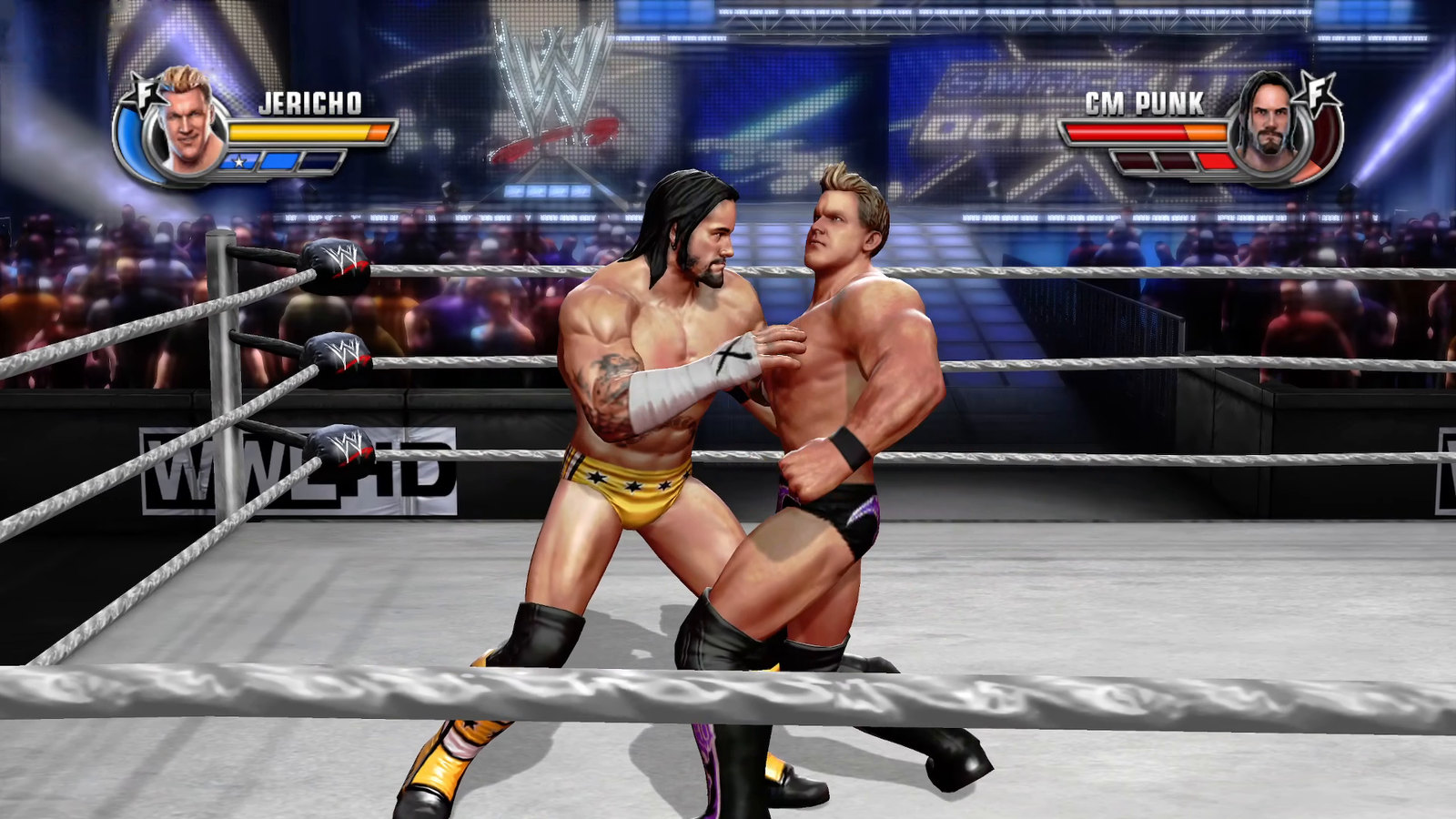 Chris Jericho and CM Punk mid-match, both health bars visible