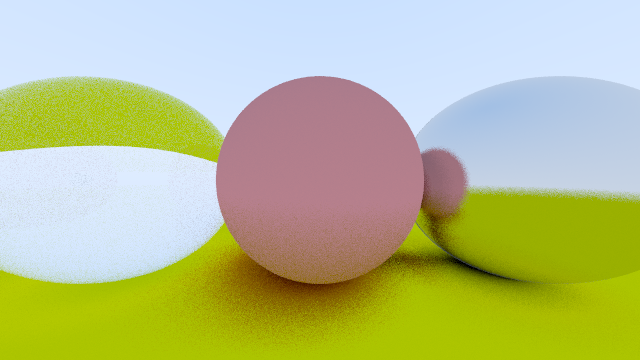 Three spheres on a green suface. One sphere is made of glass, another is matte, and the third is metallic.